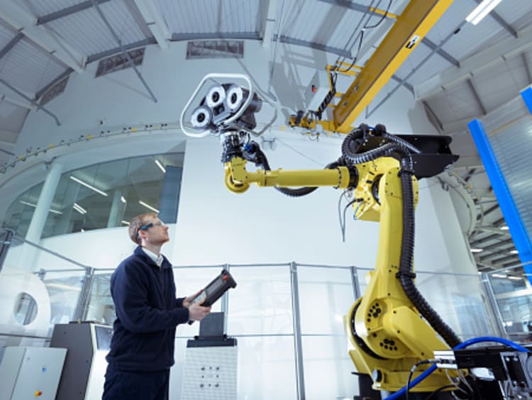 engineer testing artificial intelligence in a lab setting