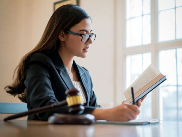 female judge studying court cases