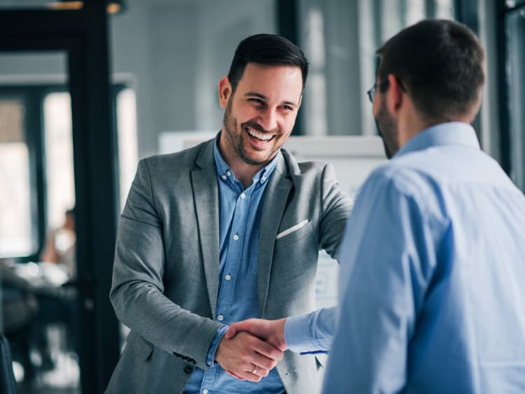 business men shaking hands