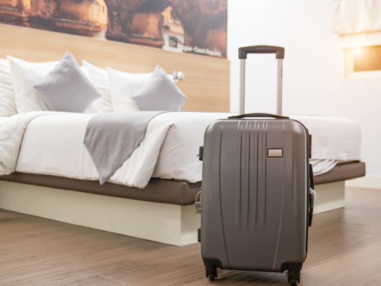 suitcase in hotel room