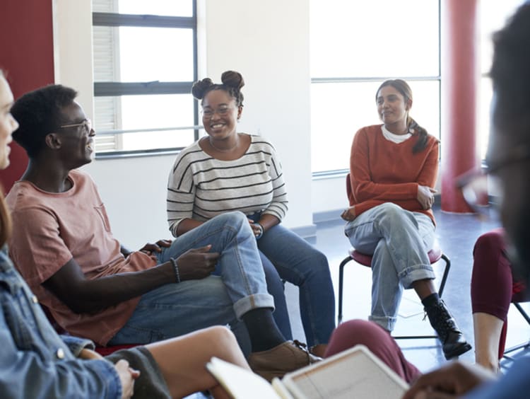 Social worker leading a group discussion