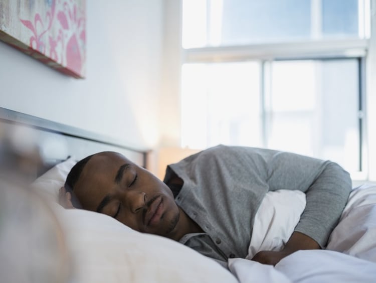 Doctoral learner sleeping in bed in the morning