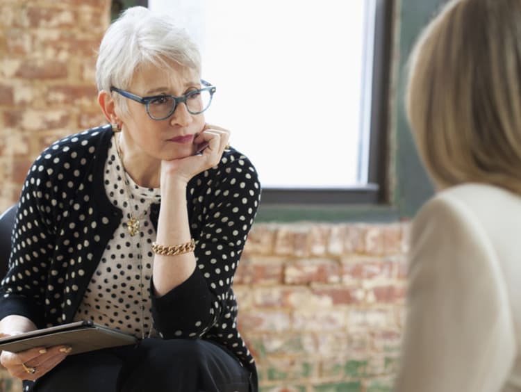 career counselor meeting with client in office