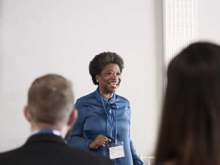 Excited business leader ready to share ideas in meeting