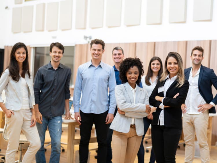 Business people standing and smiling