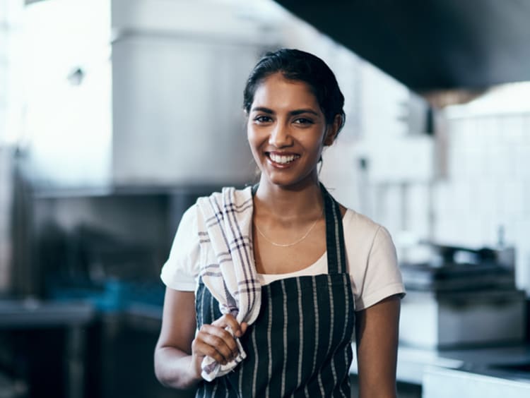 Female restaurant owner in kitchen