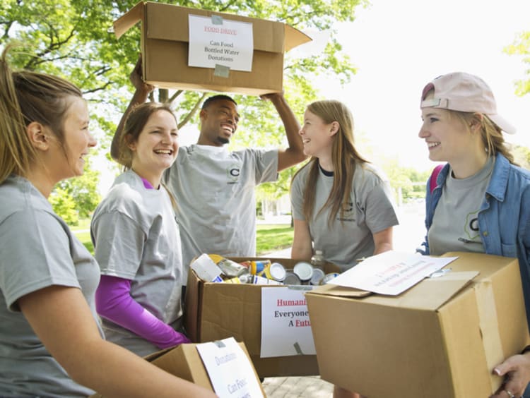 College students getting leadership experience by volunteering