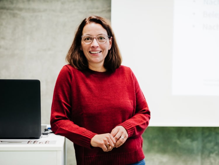 Portrait of a female college professor in her classroom