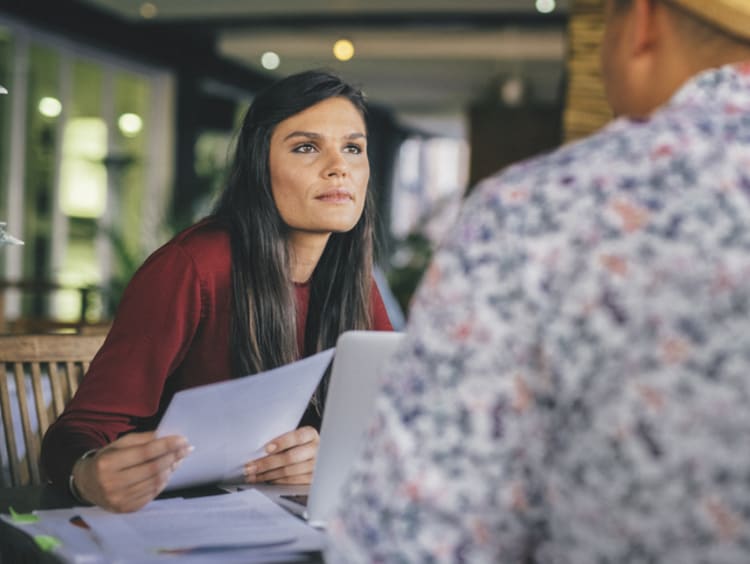 A doctoral student conducting an interview to collect quantitative data 