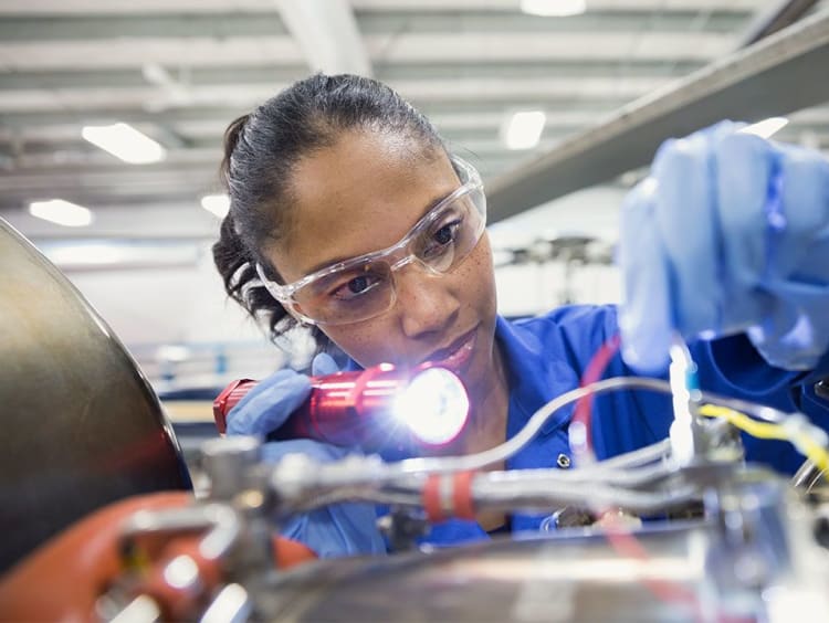 Female engineer working with electrical circuits