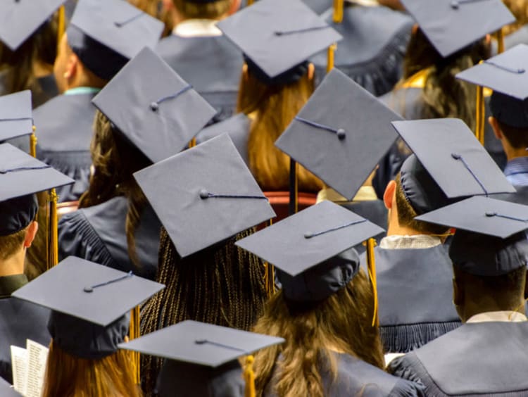 College grads wearing their caps