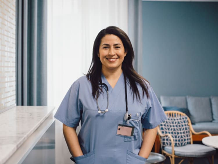 Nurse smiling in office