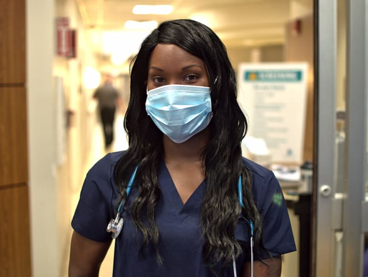 female nurse wearing mask in hospital