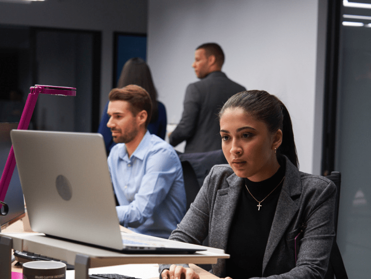 male and female computer scientists working in lab