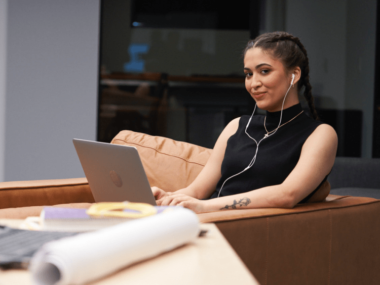 Woman looks at abandon laptop