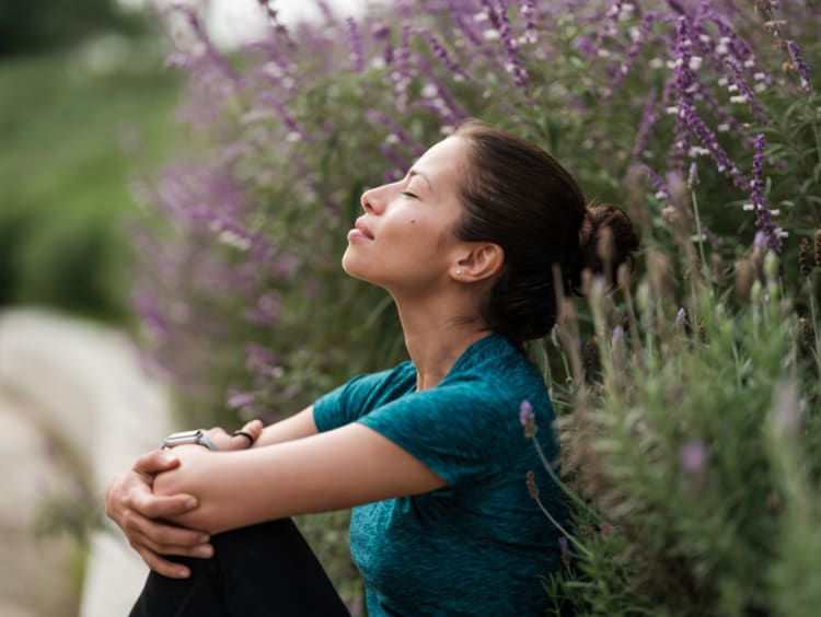 Woman taking a deep calming breath