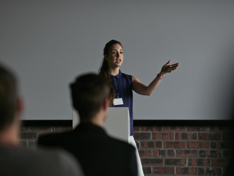 a teacher presenting during a parent teacher conference