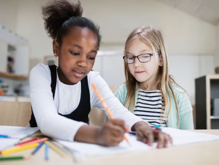 Young students collaborating in the classroom