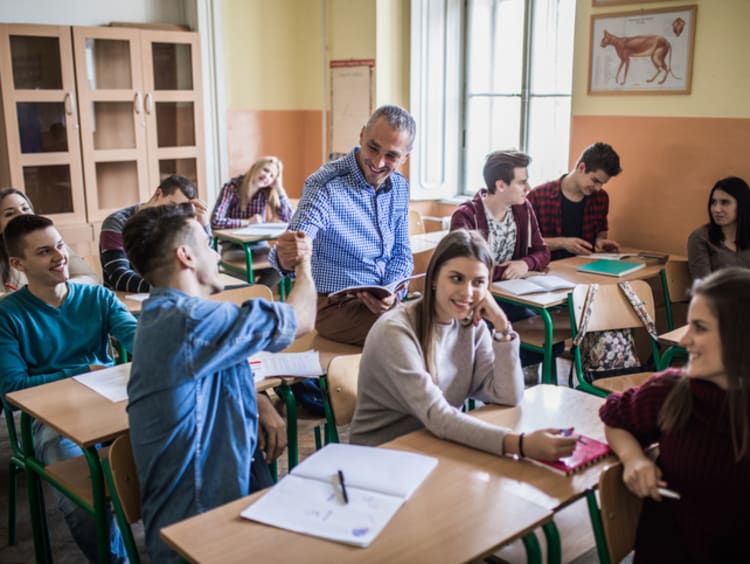 A charismatic teacher engaging with students