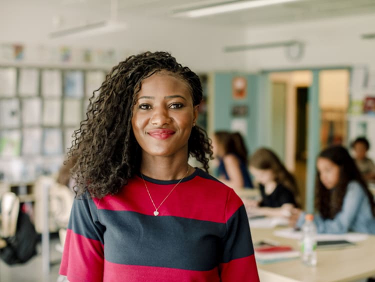 headshot of female teacher in classroom