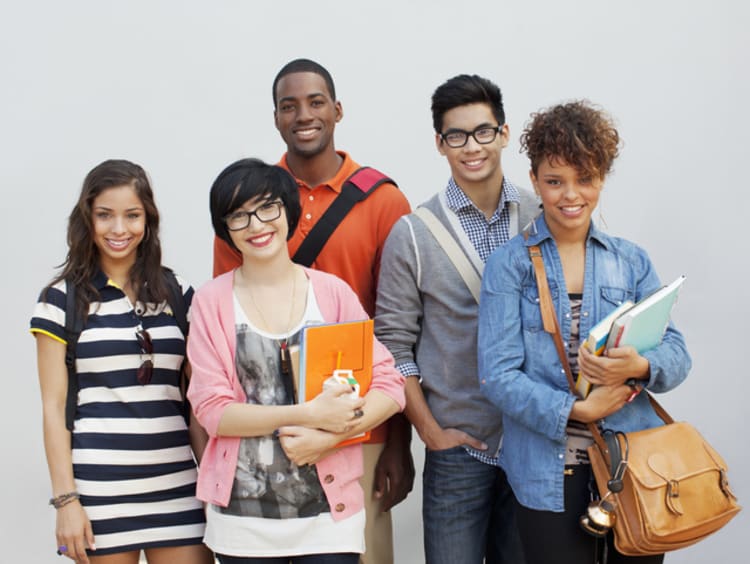 male and female students posing for first day of school picture