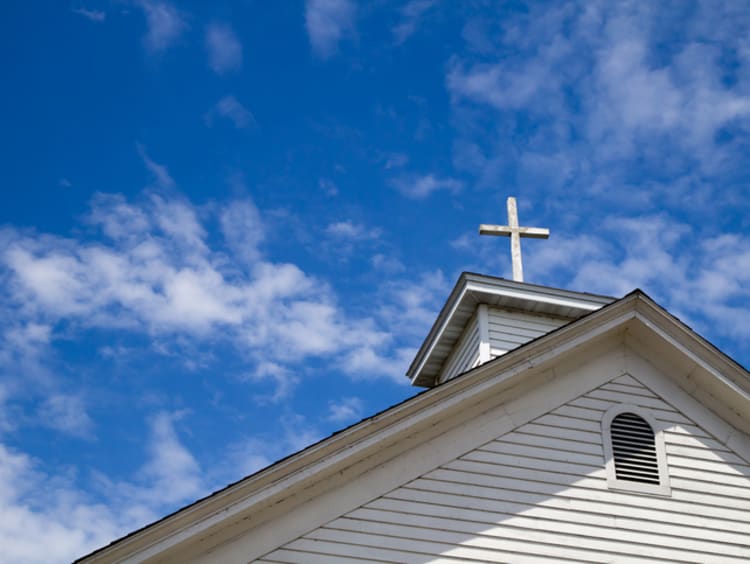 Cross Set Against A Blue Sky