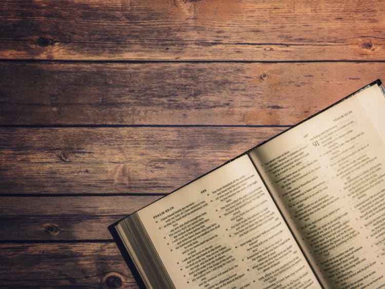 Old Testament Bible on a wooden table