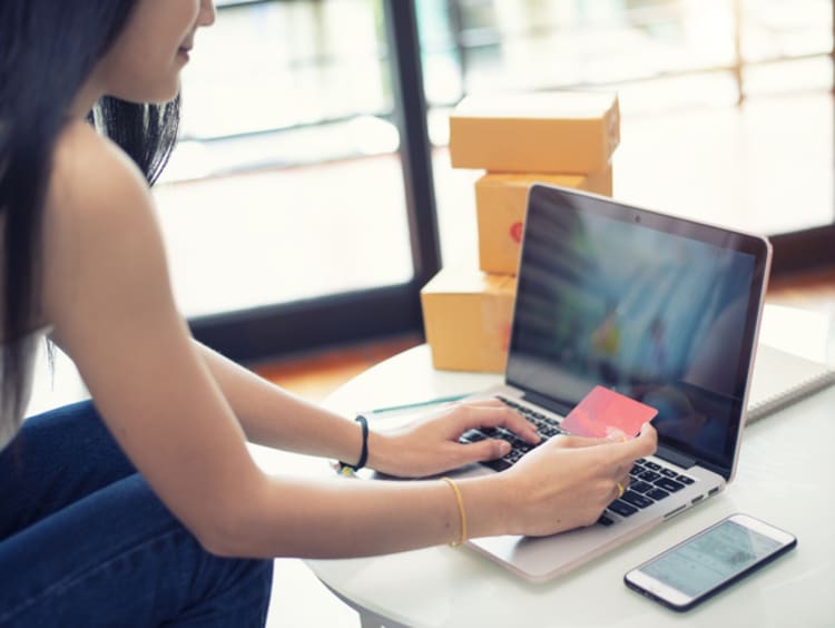 girl typing on a computer