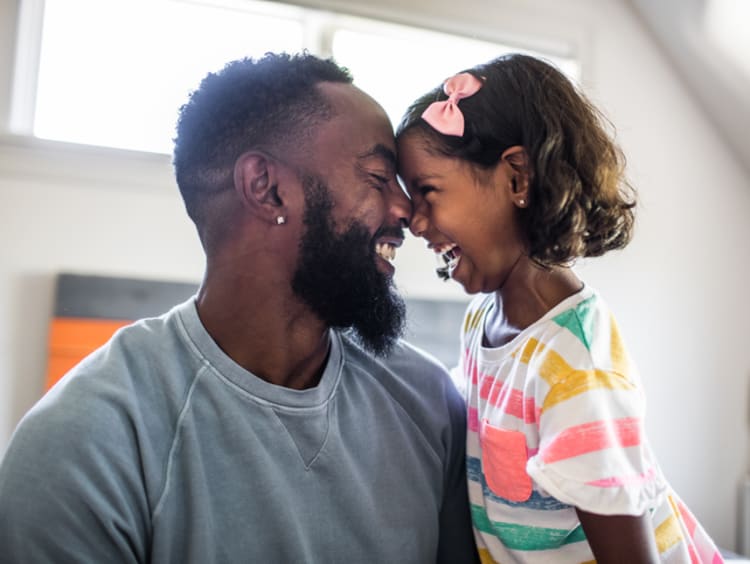 man and child smiling