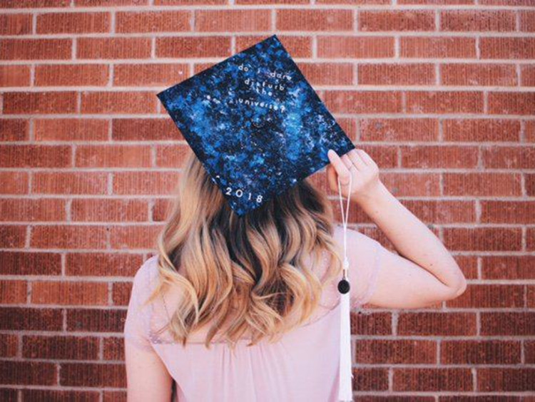 girl wearing graduation cap