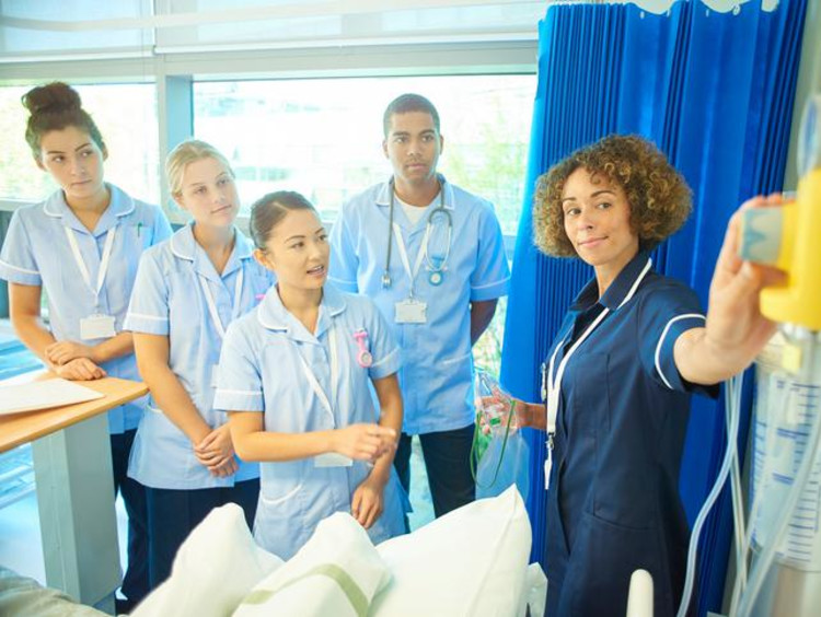 nurses in class learning about equipment