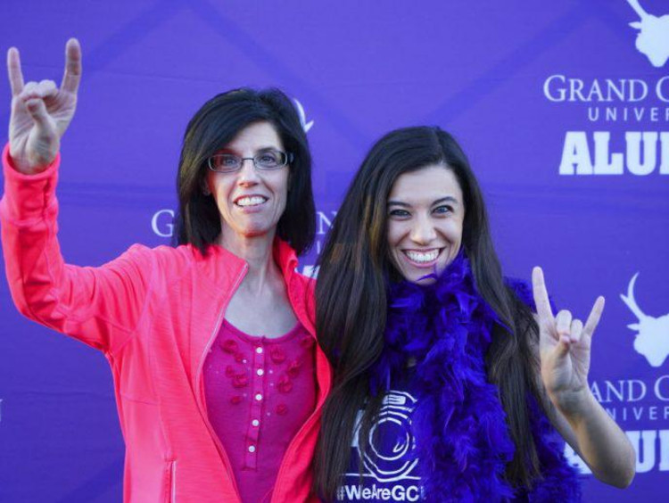 mom and student holding a lopes up