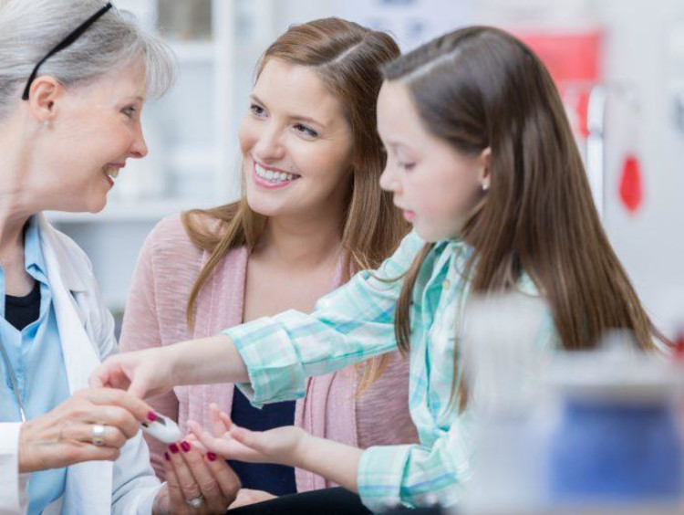nurse performing diabetes test