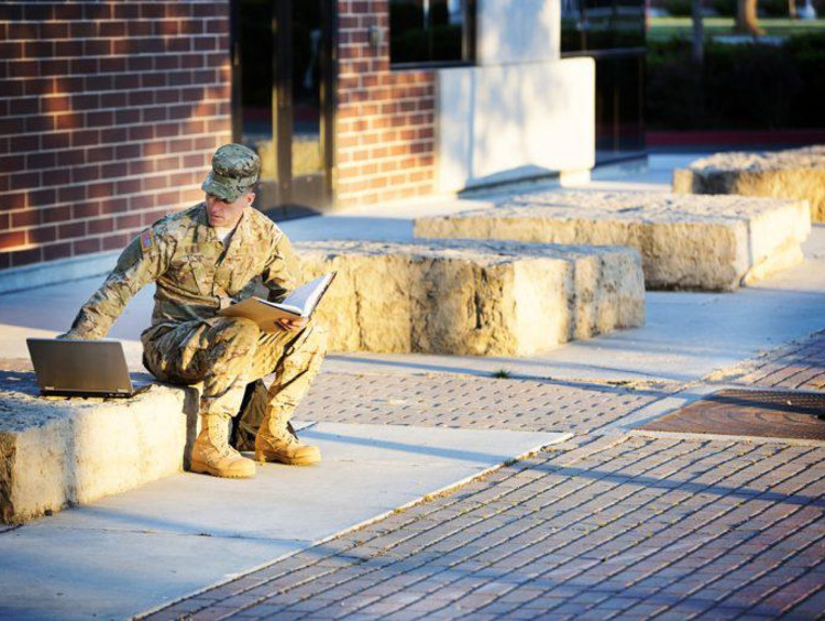 military student doing homework