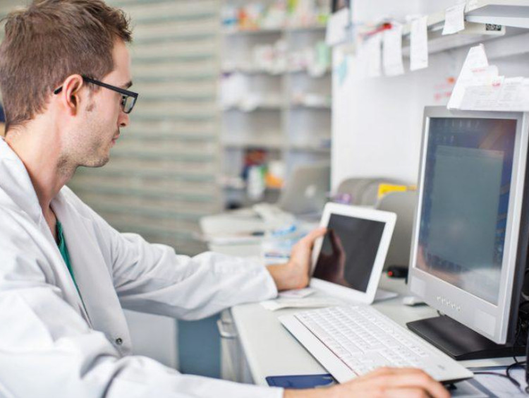 doctor looking at screen