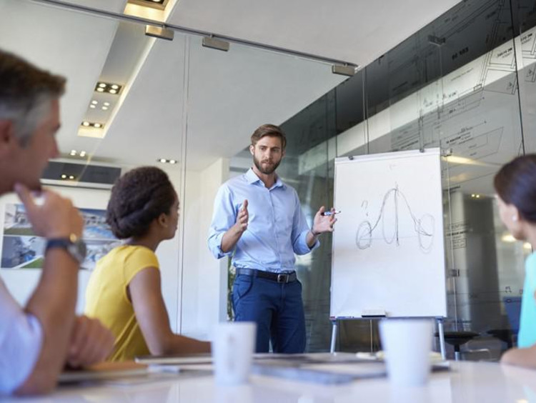 A group of people in a conference room