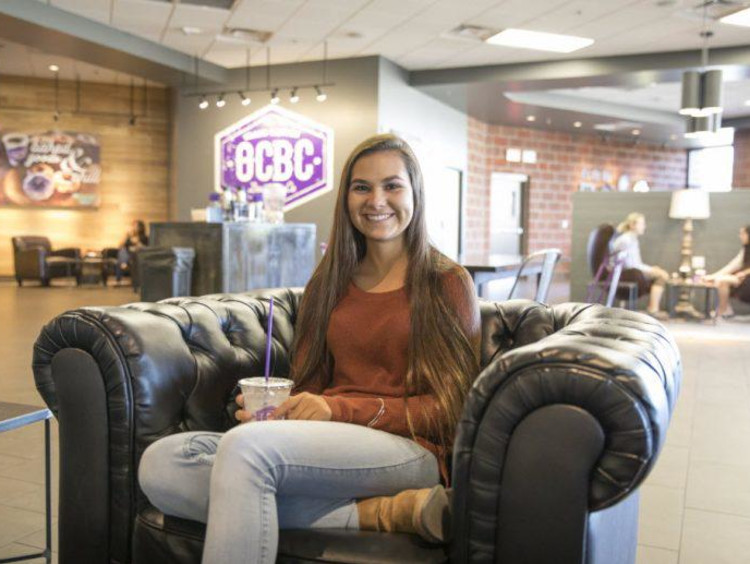 Tatum sitting in GCBC on campus