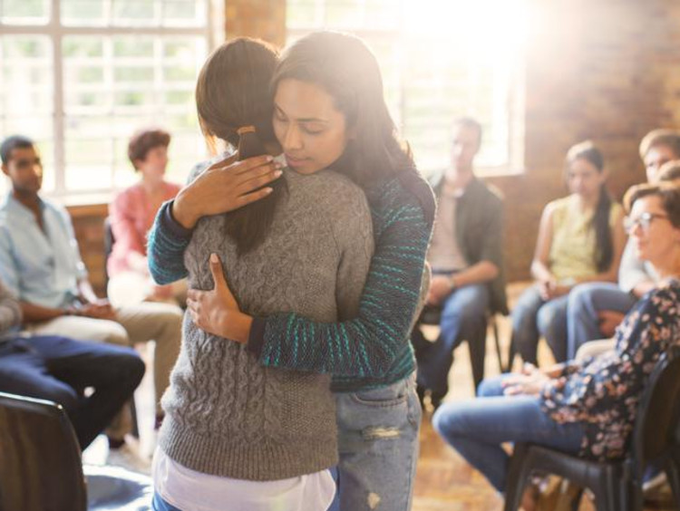 two women hugging