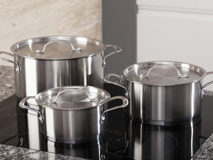 steel pots on a boiler