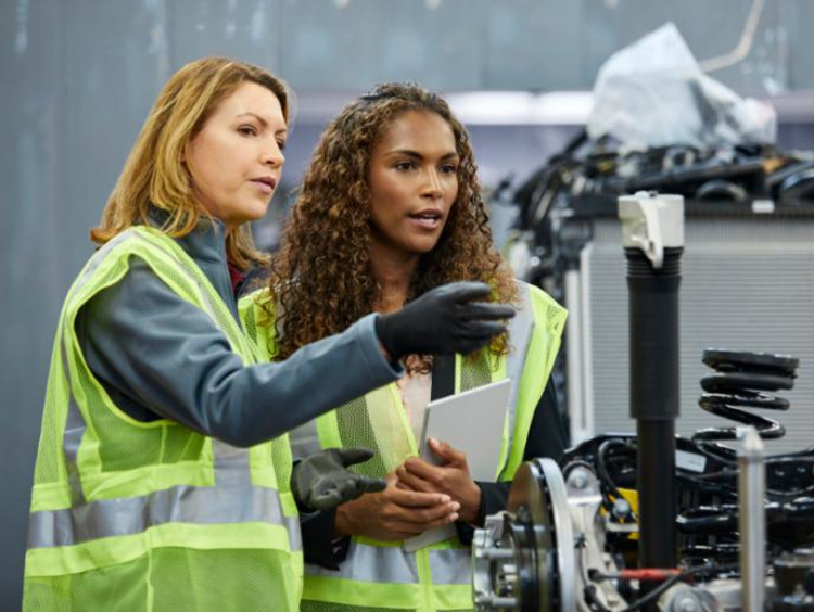 Two women doing mechanical engineering