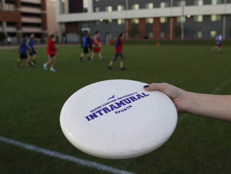 A GCU student playing Frisbee