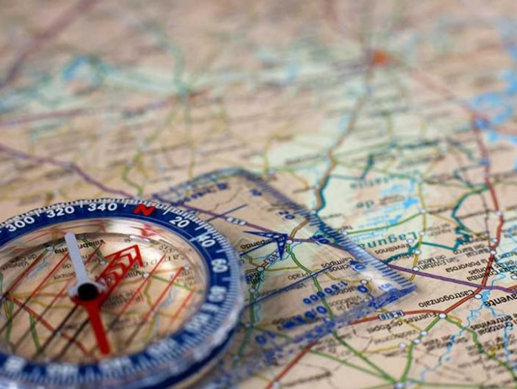 Compass on map