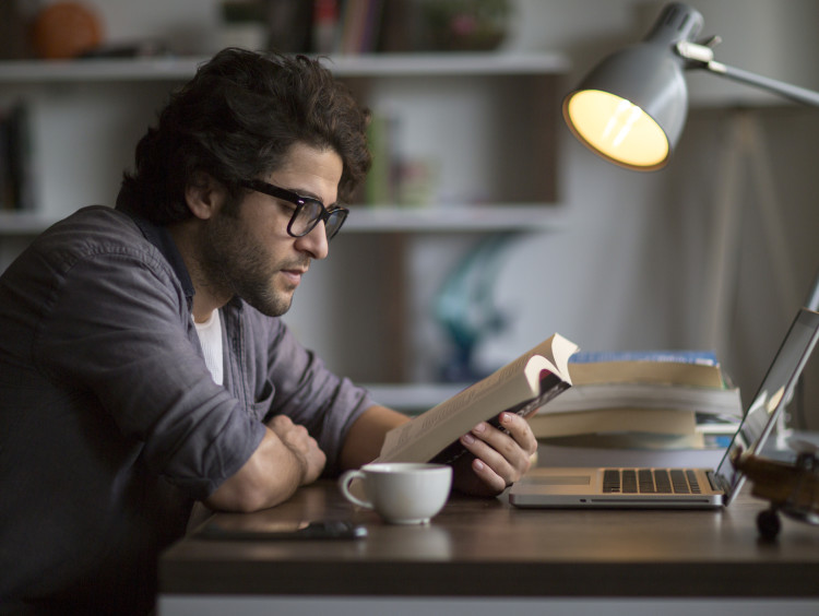 man reading his Bible