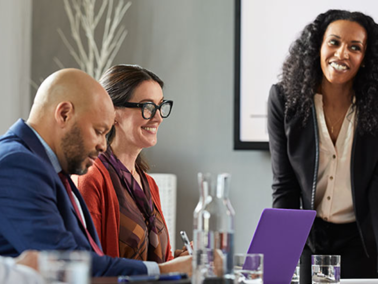 employees discuss in work office meeting setting