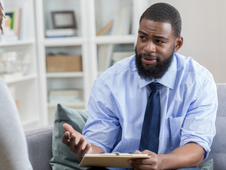psychologist talking with a patient during a session