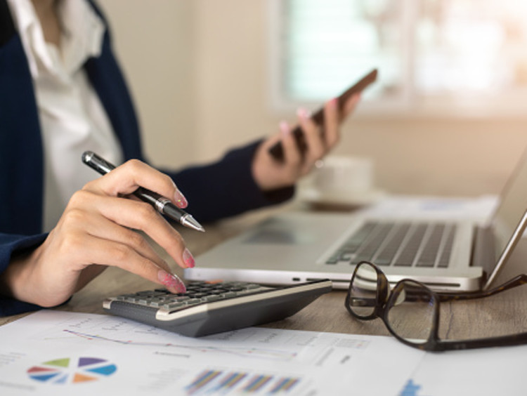 accounting degree student working on laptop