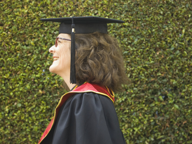 Woman graduating from degree program