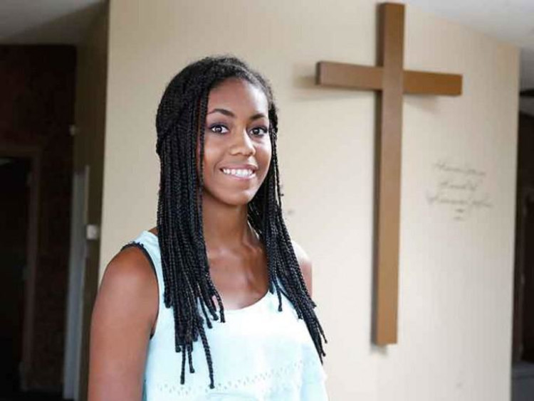 woman smiling in a church