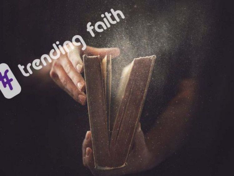 Trending faith logo over a dusty book
