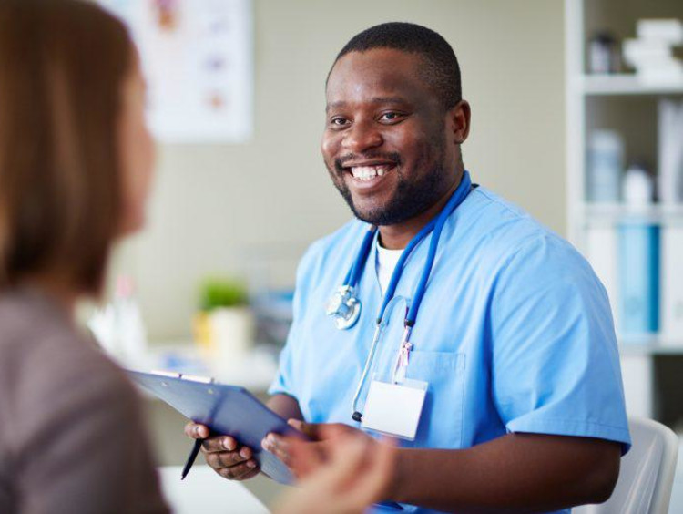 nurse talking with a patient